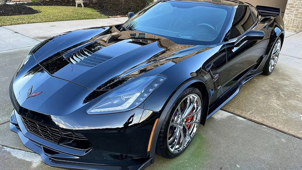 A freshly detailed black Corvette by New Life Supreme Wash in Houston